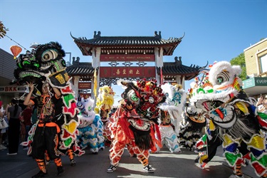 2023 Cabramatta Moon Festival Jing Yee Lion Dance in front of Pai Lau gates.