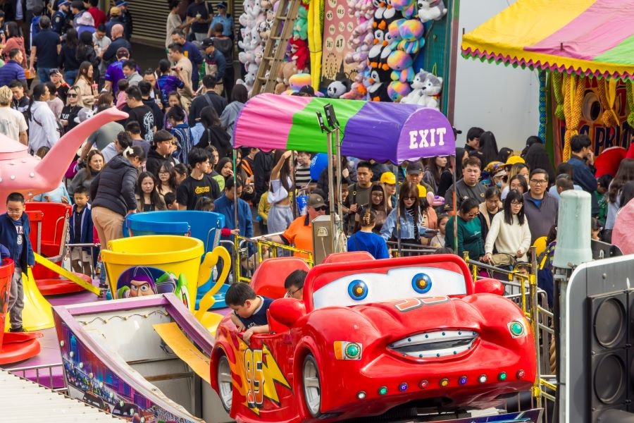 2024 Cabramatta Moon Festival amusement rides and crowd.