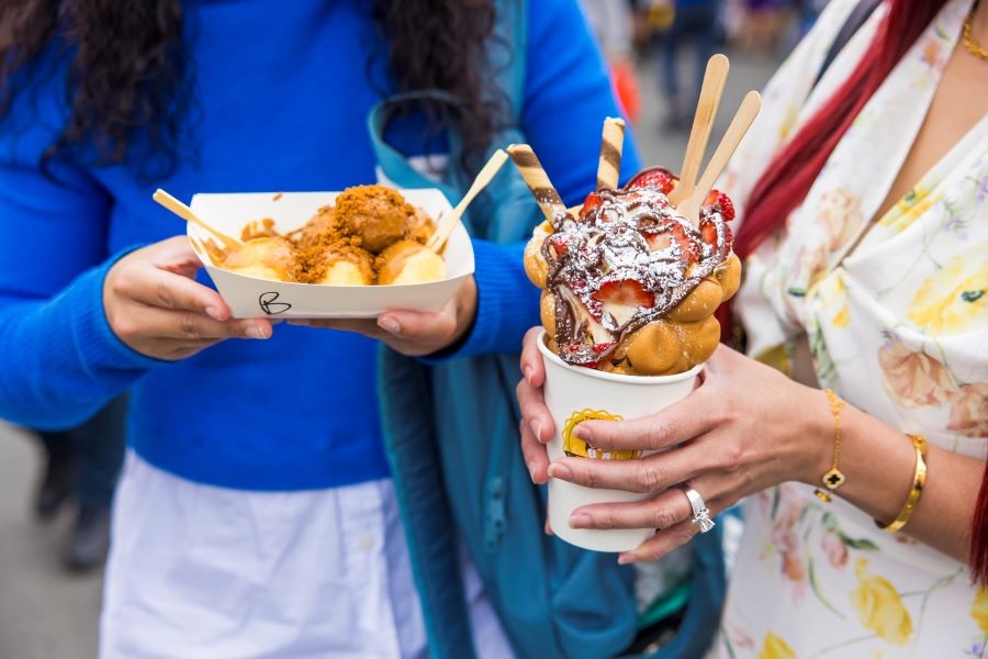 2024 Cabramatta Moon Festival people holding waffle dessert.