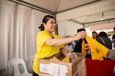 Mekong merch giveaway at 2025 Cabramatta Moon Festival by Ken Leanfore.
