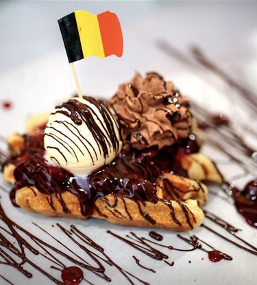 My Belgian Waffles topped with chocolate and ice cream.