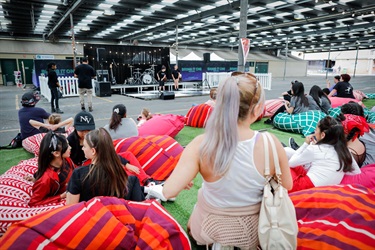 Young-people-on-bean-bags-at-Bring-It-On-Festival-2023